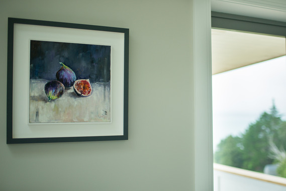 Photo of a wall with a painting of figs